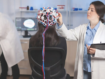 A scan being analyzed by a specialist in neuroscience, focusing on developing treatments for neurological conditions