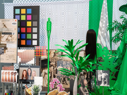 Stephanie Syjuco, detail of “Dodge and Burn (Visible Storage)” from “Stephanie Syjuco: Rogue States” at the Contemporary Art Museum in St. Louis, MO, 2019. Wooden platform, digital photos and printed vinyl on lasercut wood, chromakey fabric, printed backdrops, seamless paper, artificial plants, mixed media. Overall installation: 240 x 204 x 96 inches. Edition of 3 + 2AP. Courtesy of the artist and Catharine Clark Gallery, San Francisco