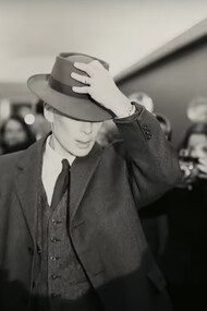 Cillian Murphy, in Oppenheimer movie as J. Robert Oppenheimer evading paparazzi