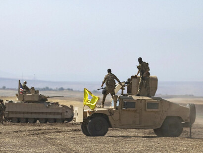 In the shadow of Turkish airstrikes and U.S. withdrawal, SDF fighters continue to hold the line, determined to defend their homeland despite mounting political and military pressure