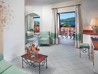 A look at one of the many elegant rooms at resort Cala di Falco in Cannigione, Italy