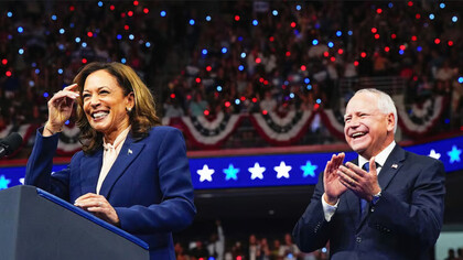 Democrat candidates Kamala Harris and Tim Walz at a rally