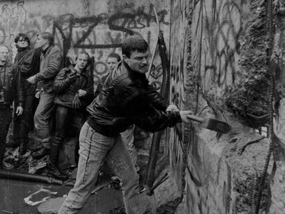 As the Berlin Wall fell, the world watched in awe, witnessing the triumph of human spirit and unity, and images of Berliners using hammers and chisels to dismantle the Wall became symbols of peace overcoming division