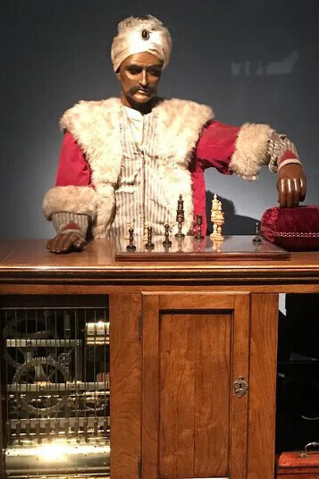 The Mechanical Turk (German: Schachtürke, lit. “chess Turk”), also known as the Automaton Chess Player or simply the Turk (Hungarian: A Török), was a chess-playing machine first exhibited in 1770 that appeared to play chess autonomously at a high level