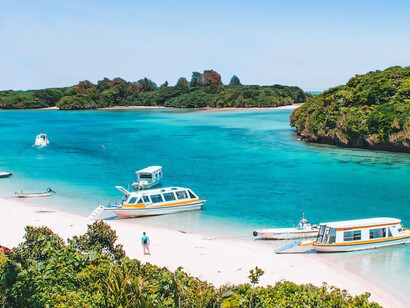 A group of boats that are sitting in the water
Kabira Bay in Ishigaki Island, Okinawa, Japan