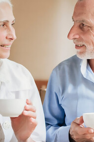 Older adults enjoying tea together, highlighting the benefits of tea antioxidants for bone health