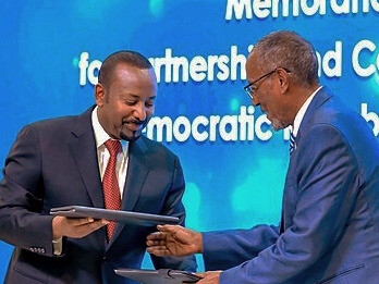 Abiy Ahmed, the Prime Minister of Ethiopia, and Muse Bihi Abdi, the President of Somaliland, shaking hands, finalising the memorandum of understanding