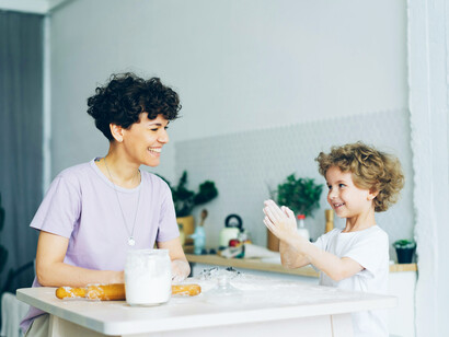 A mother and child enjoying healthy food; The gut-associated lymphoid tissue (GALT) contains a large proportion of the body’s immune cells
