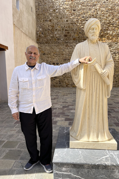 Mushahid Hussain Sayed with statue of Ibn Battuta in Morocco