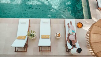 A massage by the pool helps retreat guests find strength, flow, and joy in motion © Photo by Goddess Retreats