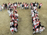 Math students at Maurice J. Tobin School in Boston, Massachusetts, USA celebrate 'Pi Day' in March, forming a human Pi symbol