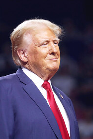 Amid the chaotic energy of his rally, Trump's cold stare suggests that his victory in 2024 is only the beginning of a larger, more turbulent era for the U.S.