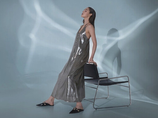 As digital fashion and eco-conscious materials gain prominence, Brazilian designers are creating stunning pieces like this silver dress to showcase a new era of style