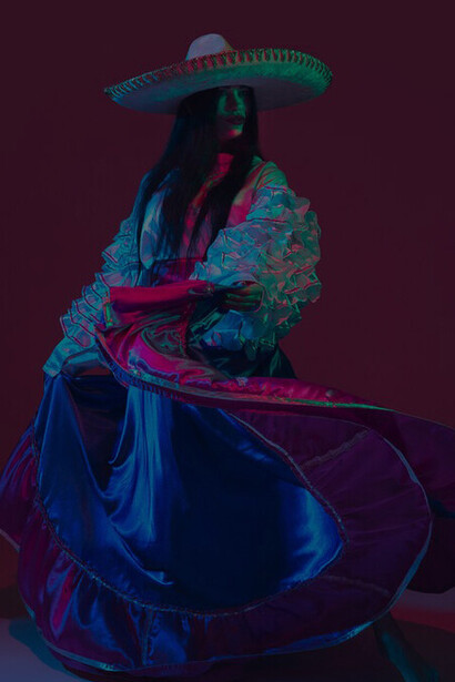 Immerse yourself in the Cinco de Mayo festivities with a captivating female dancer, bathed in neon purple light, highlighting the lively and colorful spirit of the celebration