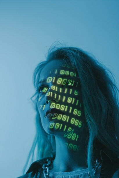 Woman with coding imprinted on her face