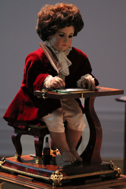 The Jaquet-Droz automata refer to three celebrated doll automata—the Musician, the Draughtsman, and the Writer—constructed between 1768 and 1774 by Pierre Jaquet-Droz, his son Henri-Louis Jaquet-Droz, and Jean-Frédéric Leschot