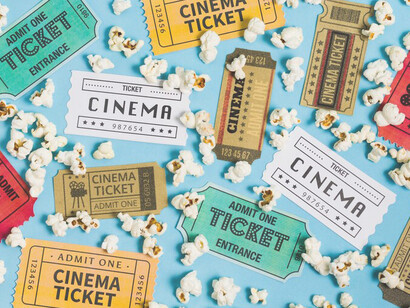 Top view of cinema tickets and 3D glasses, symbolizing the excitement of a movie experience
