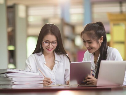 Students immersed in learning, symbolising the foundation of resilience built through education