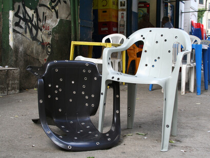 Stray Bullet Chair, 2011, 3456px x 2304px, Design da Gema, Polypropylene monobloc chair, stainless steel eyelets. Courtesy of the artist, Brazil. Photo by David Elia