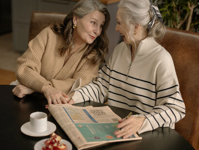 While apps promise brain training, the concentration on a newspaper crossword speaks volumes about the power of focused, traditional puzzles