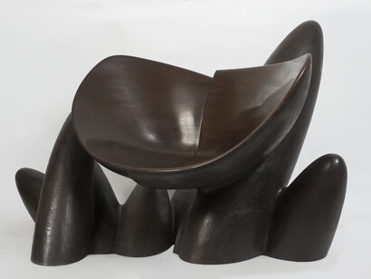 Crossroads, 2014, Stained Ash, 38.125 x 83 x 41.125 inches. Courtesy of Wendell Castle and Friedman Benda. Photography: Bill Orcutt