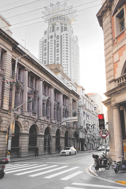 Cars parked on street in front of building during daytime, Shanghai, China