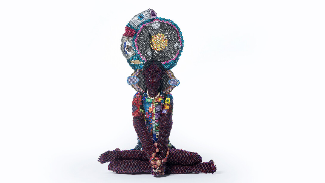 Joyce J. Scott, Harriet Tubman as Buddha, 2017, plastic and glass beads, metal, thread, yarn and rocks, 40 x 25 x 15 inches (101.6 x 63.5 x 38.1 cm). Image courtesy of the artist and Peter Blum Gallery, New York
 