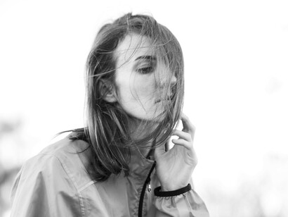 A portrait of a lonely woman, reflecting the themes of femcel culture, loneliness, and isolation