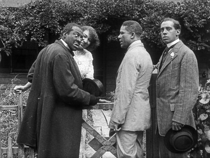 Scene still Bert Williams Lime Kiln Field Day Project. From left to right: Bert Williams, Odessa Warren Grey, unidentified, Walker Thompson