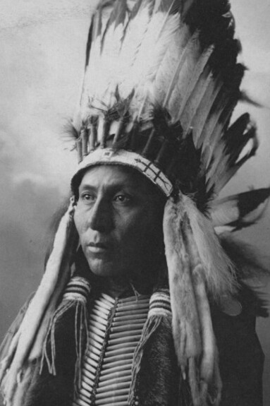 An historical photograph of Hubble Big Horse, a Native American man from the Cheyenne tribe, taken in 1898 in the USA