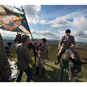 Jeremy Sutton-Hibbert, Royal Burgh Standard Bearer Martin Rodgerson and his Burleymen attendants, Three Brethren cairns summit, during the Common Riding festivities in Selkirk, Scotland, 2013 from the series Unsullied and Untarnished © Jeremy Sutton-Hibbert/Document Scotland 
