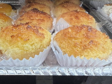 Queijadinhas are traditional baked sweet pastries originating from Brazil and Portugal