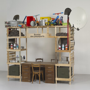 Antarctica World Passport Delivery Bureau, Palais Iéna Paris, 2012
Bureau construction in reclaimed materials, chair, desk, vintage military canteens, various objects, Antarctica World Passports, passport stamps, ink pads
220 x 60 x 240 cm variable
Courtesy of the artists. Photo: Bertrand Huet