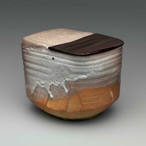 Miwa Kyūwa (Miwa Kyūsetsu X), Japanese, 1895–1981 , Hagi-glazed water jar with lacquer lid, Japan, Heisei period (1989–present), 1970–79, Hagi-glazed stoneware. H. 5 7/8 in. (14.9 cm); W. 7 3/4 in. (19.7 cm); D. 6 1/4 in. (15.9  cm). The Metropolitan Museum of Art, Purchase, Michael and Tamara Root Gift, 2016