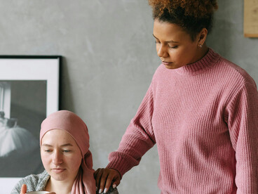 Holding hands as a sign of resilience and connection while living with terminal illness