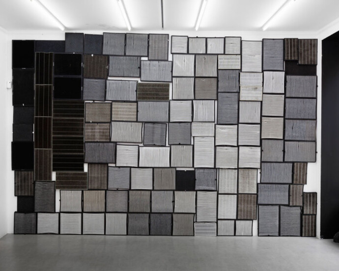 Liu Bolin, Exhibition view. Courtesy of Galerie Paris-Beijing