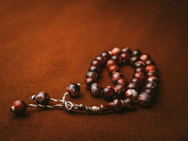 Traditional beads tied around the neck, representing protection, faith, and community values in the modern times