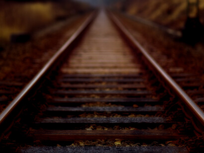 A train track. The youth that excited you of unknown things, now it's only a passage of time looking at various people to see how things are, and how they will be