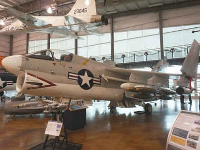 A Bell TH-1L Iroquois and an LTV A-7 Corsair II on display at the Frontiers of Flight Museum at Dallas Love Field in Dallas, Texas, United States