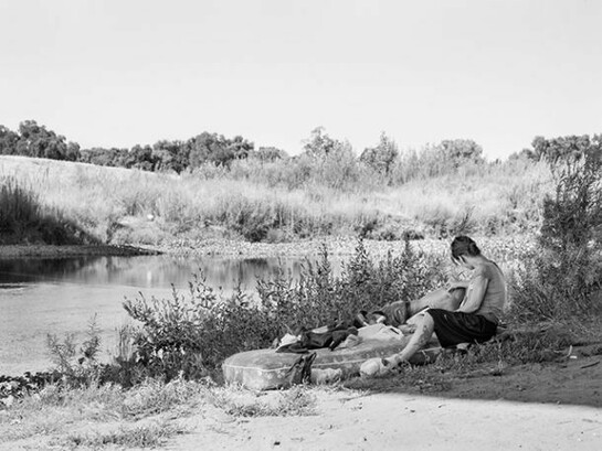 Katy Grannan, April and Robert on mattress under 9th Street bridge, Modesto, CA, 2014