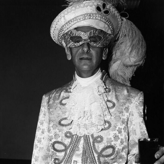 Diane Arbus, Masked man in white, N.Y.C. 1967 © The Estate of Diane Arbus