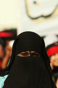 Libyan girl wearing a niqab during the demonstrations against the regime of Gaddafi in Bayda, Libya