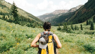 Solo traveler looking at the mountain view 