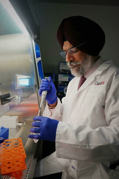 Researcher reviewing medical studies to separate proven therapies from placebo effects
