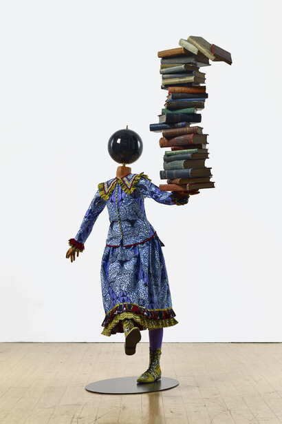 Yinka Shonibare MBE b. 1962, Girl Balancing Knowledge (2015)
Fibreglass mannequin, Dutch wax printed cotton textile, books, globe and steel baseplate
179 x 139 x 89 cm (70 1/2 x 54 3/4 x 35 in.)
Photographer: Stephen White
Image courtesy the artist, Stephen Friedman Gallery,
London and Pearl Lam Galleries, Hong Kong, Shanghai
and Singapore
