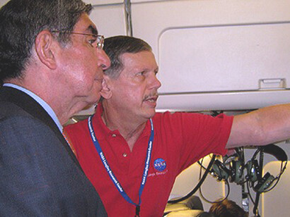 Dr. Ed Browell is shown here answering a question that President Sanchez asked about the Saharan dust the research team observed to the east of Costa Rica over the Caribbean