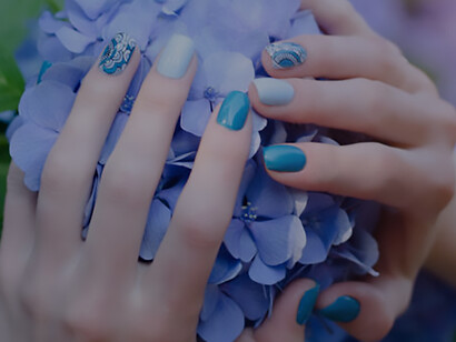 Graceful femininity: Hands with romantic manicured nails delicately placed on peonies, elevating your style