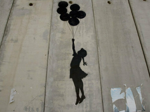 Grafiti de Bansky en el muro de Cisjordania