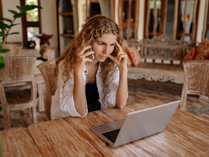 A millennial concentrating on a phonecall with a superior over details concerning the project