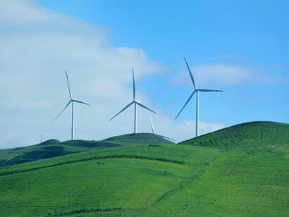 Harnessing renewable energy from wind turbines across the lush valleys of Uzbekistan